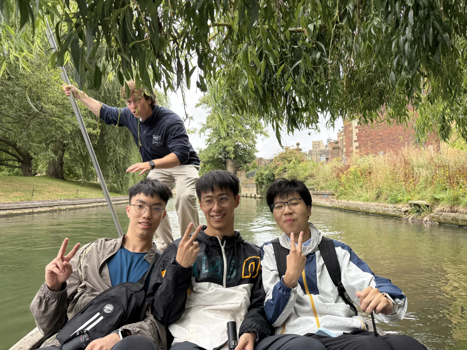 Punting on the River Cam during a summer tour of Cambridge